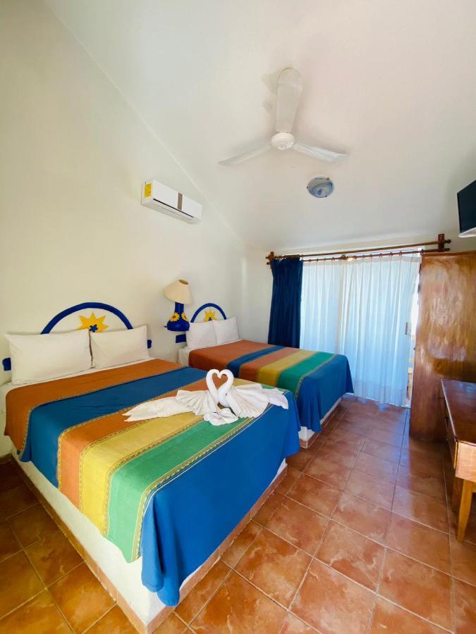 Hotel Boutique Eden Costa Санта Крус Уатулко Екстериор снимка